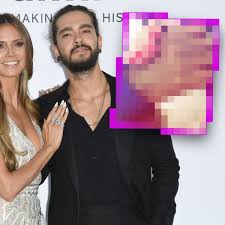 The tattoo has three stars and a wavy design. Neues Tattoo Bei Heidi Klum Entdeckt Bedeutet Dieses Zeichen Tom Kaulitz Fanbase