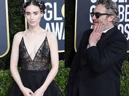 Joaquin phoenix and rooney mara got engaged in 2019. Joaquin Phoenix Didn T Walk The Golden Globes Red Carpet With Fiancee Rooney Mara So He Could Sweetly Admire Her Instead Business Insider