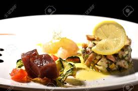 Sausage & shrimp appetizer with sriracha mayo (5 ingredients)gluten free palate. Fine Dining Seafood Appetizer With Tuna Sashimi Octopus Salad Stock Photo Picture And Royalty Free Image Image 50815859