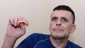 Man forced to wear dead man's donated dentures after failing to find NHS  dentist