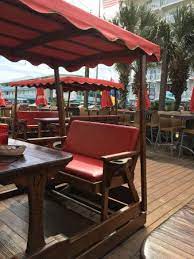 W/d in unit bathtub balcony pool/gym open floor plan quite community really nice. Outdoor Swing Tables Picture Of Coconuts Restaurant Panama City Beach Tripadvisor