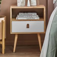 When choosing a white bedside tables, consider the existing furniture in your bedroom. Temple Webster White Oak Luna Bedside Table