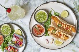 Fresh fish tacos fresh ﬁsh, roasted tomatillo sauce, cabbage, pico de gallo, queso fresco, ﬂour tortillas kalua pork tacos duroc all natural smoked pork shoulder, pickled onion, shredded cabbage, wasabi crema, ﬂour tortillas. The Ned Launches Taco Tuesdays