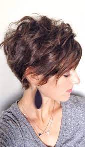 The hair has lots of texture and movement that reflects light from the glossy surface. Pin On Pixie Cuts For Round Face