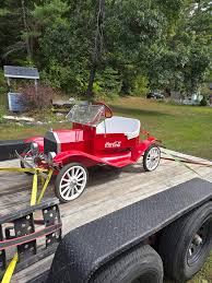 What are you guys running for a replacement vertical shaft engine that has  a weighted flywheel? The original engine is low