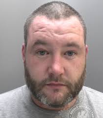 Anglesey man who attacked ex in front of son sentenced