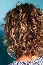 Opt for a blunt cut across the ends to create the illusion of volume, and styling waves with your favorite hair straightener or curling iron will give it even more. 21 Sassy Short Curly Hairstyles To Wear At Any Age Cj Warren Salon Spa