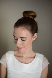 Braided bun is always gorgeous and stunning. A Wraparound Braided Bun Tutorial M Loves M