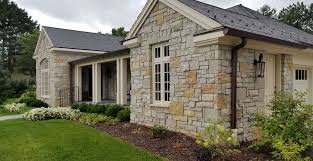 This traditional fireplace stone design was created using castle stone veneer in the colour mountain. Custom Ashlar And Castle Rock Stone Veneer Siding And Stone Home Buechel Stone