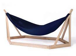 Hammocks are typically used outside, but that doesn't mean you can't break the rules a bit and bring them inside by adding one to your bedroom, living room, sunroom, or even your attic! 10 Diy Hammock Stand Ideas That You Can Make This Weekend Craft Directory Diy Hammock Unique Furniture Design Hammock Stands