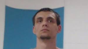 Escaped inmate being held