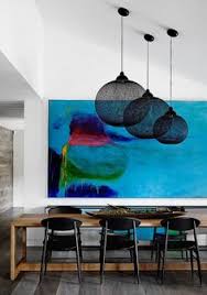 A Vibrant Painting Hangs In The Dining Room Of This Templestowe House Designed By Christopher Elliott Design Where It Adds Li Interior Art Oversized Art Design