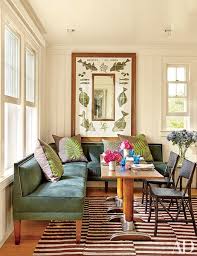 A dining room and two bedrooms each with two beds, a couch bed and a bathroom with shower. Look Inside An Early 20th Century Shingle Style Getaway In The Hamptons Dining Nook Upholstered Banquette Home Decor