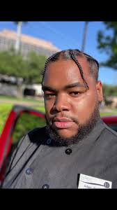 Tall Black Man with Braids