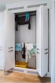 For those who want to dry shoes with ease. Ingenious Storage Solutions Interior Design Blog Laundry Cupboard Drying Cupboard Laundry Room Diy