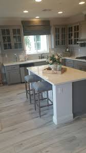 Set your store to see local. Grey Wood Kitchen Flooring Kitchen Cabinet Remodel Farmhouse Kitchen Cabinets Kitchen Floor Tile