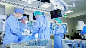 Surgical Healthcare Medical Training Team In Scrubs Working In Modern Hospital Stock Footage Training Team Medica Medical Training Orthopedics Modern Hospital
