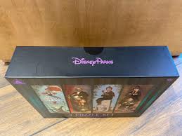 Message in a haunted mansion. Photos New The Haunted Mansion Puzzle Set Featuring Stretching Room Portraits Offers A Chilling Challenge In Disney Springs Wdw News Today