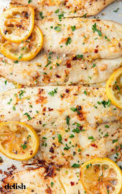 Garlicky Lemon Baked Tilapia Is Crazy Addicting Recipe Seafood Dinner Tilapia Recipes Recipes