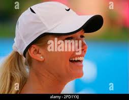 In this image made available by the Laureus Sports Academy, Argentine model  Valeria Mazza smiles during a celebrity tennis match in Barcelona, Spain,  Monday May 22, 2006. (AP Photo/Paul Gilham, Laureus Sports Academy Stock  Photo