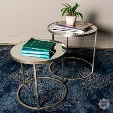 Do you need some extra storage ideas but can't figure out where to put everything? Avery Set Of Two Side Tables Round Mirrored Silver