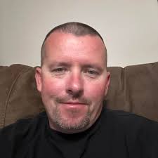 What is the true height of the Rmaxx to fit through a garage door?