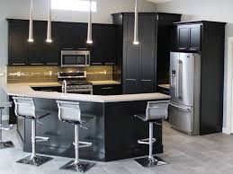Black color cooktop that blends well with most decor. Complete Kitchens Discount Cabinets Appliances