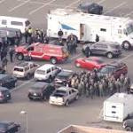 Barricaded suspect kills deputy, wounds