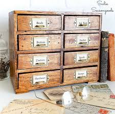 Mixed materials like marble and wood, intricate details and sleek finishes are paired with unique designs to create a variety of contemporary, transitional and mid century modern coffee tables. Amazing Farmhouse Faux Card Catalog Makeover Diys The Cottage Market