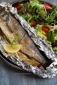 Lemon Stuffed Mediterranean Sea Bass Branzino Cooked In Foil Spicie Foodie Healthy Fish Recipes Recipe Fish Recipes Healthy Recipes Fish Recipes