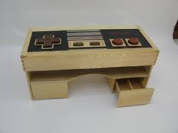So i built this, to replace my current coffee table, it has space inside it to store game boxes etc. Functional Nintendo Controller Coffee Table 3 Steps With Pictures Instructables