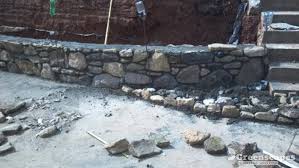 Thin veneer, building stone, boulders and outcroppings. Doggett Mountain Stone Masonry Retaining Wall