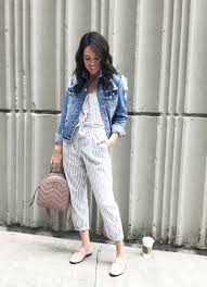 Black And White Striped Jumpsuit With Jacket Easy Travel Style Striped Jumpsuit Jean Jacket With Gucci Backpack So Comfy Stripe Jumpsuit Outfit Striped Jumpsuit Spring Jumpsuits