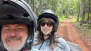 Rosie and Keith (Plymouth helper) having just completed Rosie's first ride 