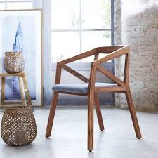 Vous pouvez aussi sans faute de goût mêler modernité et tradition en optant pour des chaises anciennes revisitées. Chaise Originale En Palissandre Massif Pas Cher Tikamoon Chaise Deco Chaises Bois Fauteuil Bureau Design
