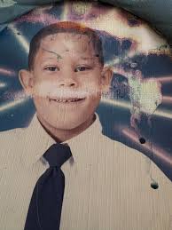 Can someone clean up my son's picture?