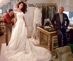 Amal Alamuddin S Wedding Dress Behind The Scenes At Her Final Fitting With Oscar De La Renta Amal Clooney Wedding Dress Celebrity Wedding Dresses Oscar De La Renta Wedding Dress