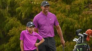 The golf ball doesn't roll far from the rough. Tiger Woods Beams Over Son Charlie S Impressive Performance At Pnc Championship Entertainment Tonight