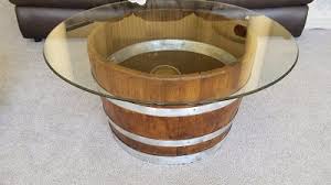 To add an interesting finish to your table, you can use large bolts (available from craft shops) to nail in the top supporters around your glass. 135 Wine Barrel Furniture Ideas You Can Diy Or Buy Photos