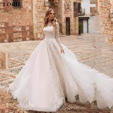 You will find a high quality lace long sleeve wedding dress at an affordable price from brands like lakshmigown , serene hill , yiaibridal , amanda novias. Lorie Princess Wedding Dress A Line Long Sleeve Lace Bridal Dresses Vestidos De Novia Boho Wedding Gown With Romantic Buttons Wedding Dresses Aliexpress