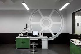 Mechanical Office Motifs Kh Gears Revs Its Design Muscles With This Interior By Arboit Artdesig Office Lighting Design Office Interiors Corporate Interiors