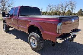 Image result for Dark Toreador Red 2000 F250