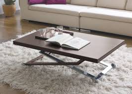 Una mesa de centro elevable o una mesa de centro convertible pueden aportar ese plus de utilidad que buscas en un mueble de diseño como nuestras mesas. Mesa De Centro Elevable Y Extensible Tiber Nogal Ambar Muebles Mesa Centro Elevable Mesa De Centro Convertible Mesa De Centro Plegable