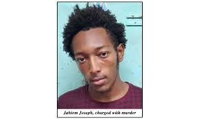 Ladyville resident charged for Hopkins murder