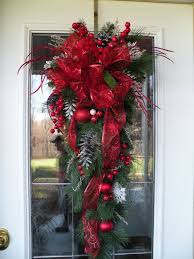 My daughter has asked me to help her with. Holiday Swags Christmas Door Swag Christmas Teardrop Swag Red Christmas Swag Red Christmas Wreaths Christmas Door Decorations Christmas Swags