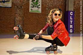 A fun safe place for kids to hang out and skate! Artistic Roller Skating That Move Is Called Shooting The Duck Roller Girl Red Leather Jacket Roller Skating