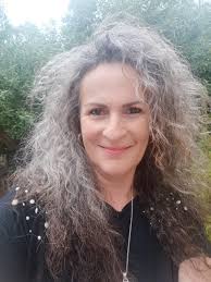 I'm 55 and my hair is curly/ frizzy.I mostly straighten and ware up. Any  suggestions. Be nice please