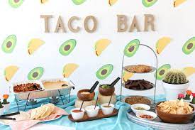 Decorate your fiesta themed party with brightly colored tassels, or even make your own tissue paper flowers. Stress Less Taco Bout A Future Catered Graduation Party Ideas Happy Hour Projects