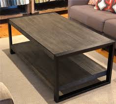 Brown and black metal base wooden nesting set of 3 coffee end tables. Wood Metal Coffee Table