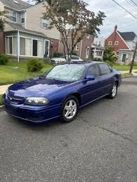 Image result for Sport Red 2005 Impala